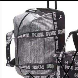 Pink Victoria’s Secret Luggage